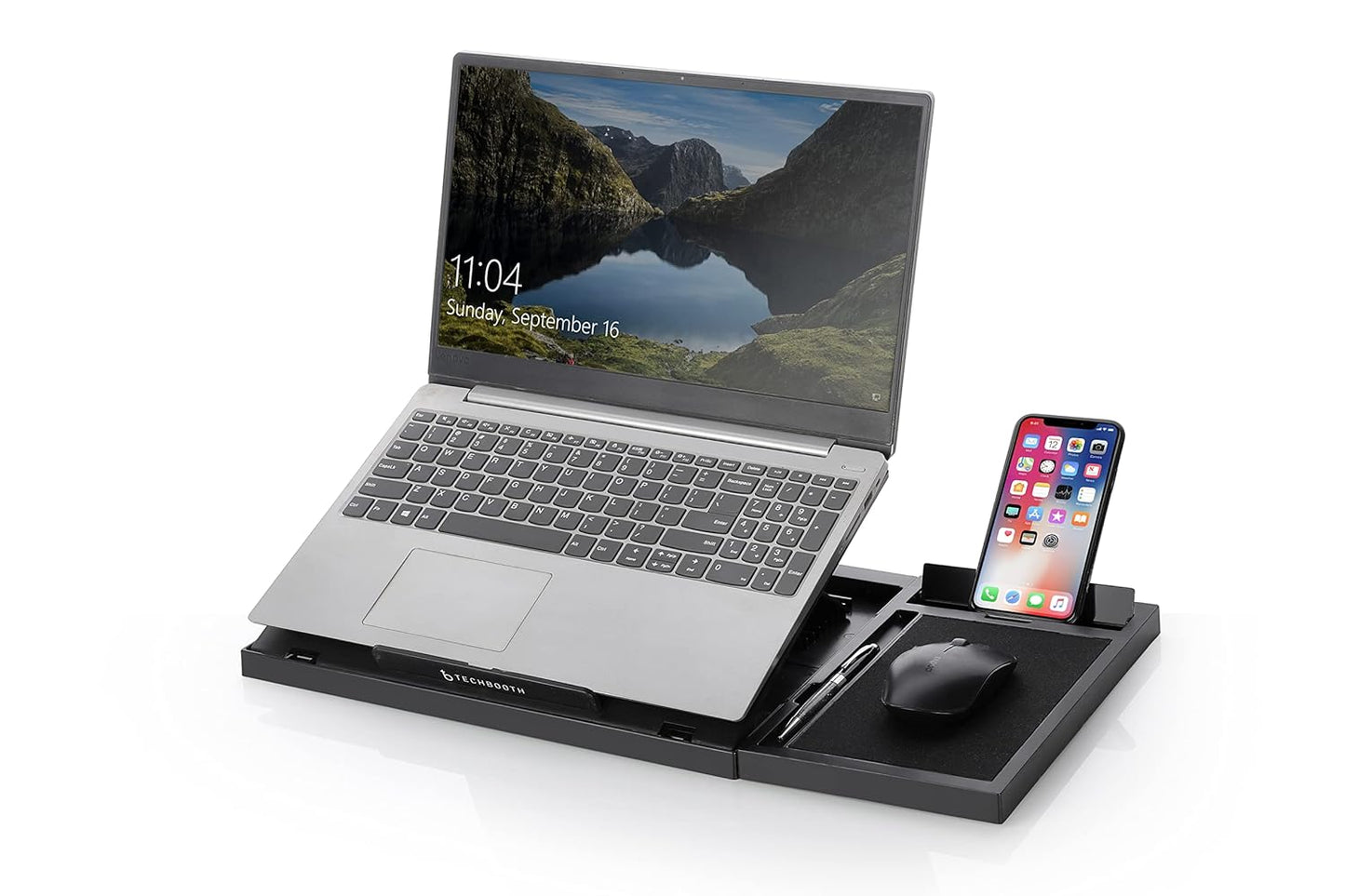 Laptop on a stand with smartphone and mouse on a white background