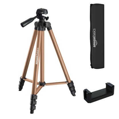Camera tripod with carrying case and smartphone holder on a white background