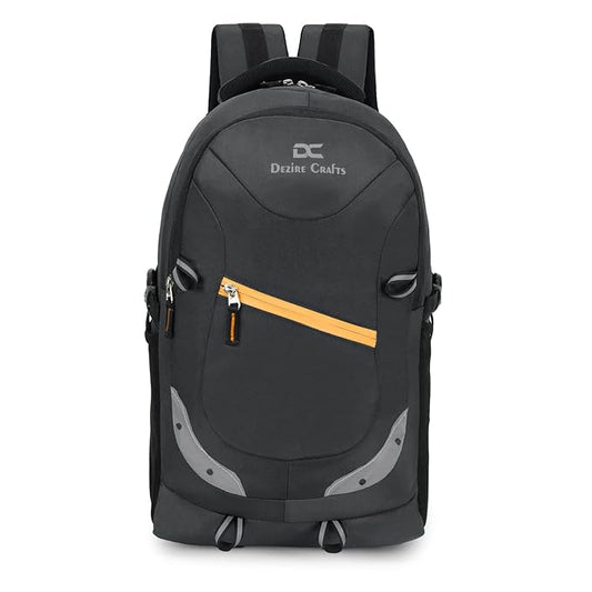 Black backpack with a yellow zipper on a white background, featuring the Dezine Crafts brand.