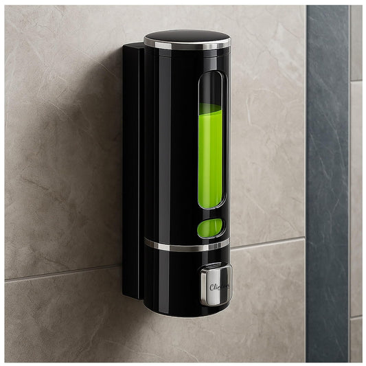 Black soap dispenser with green liquid on a tiled wall