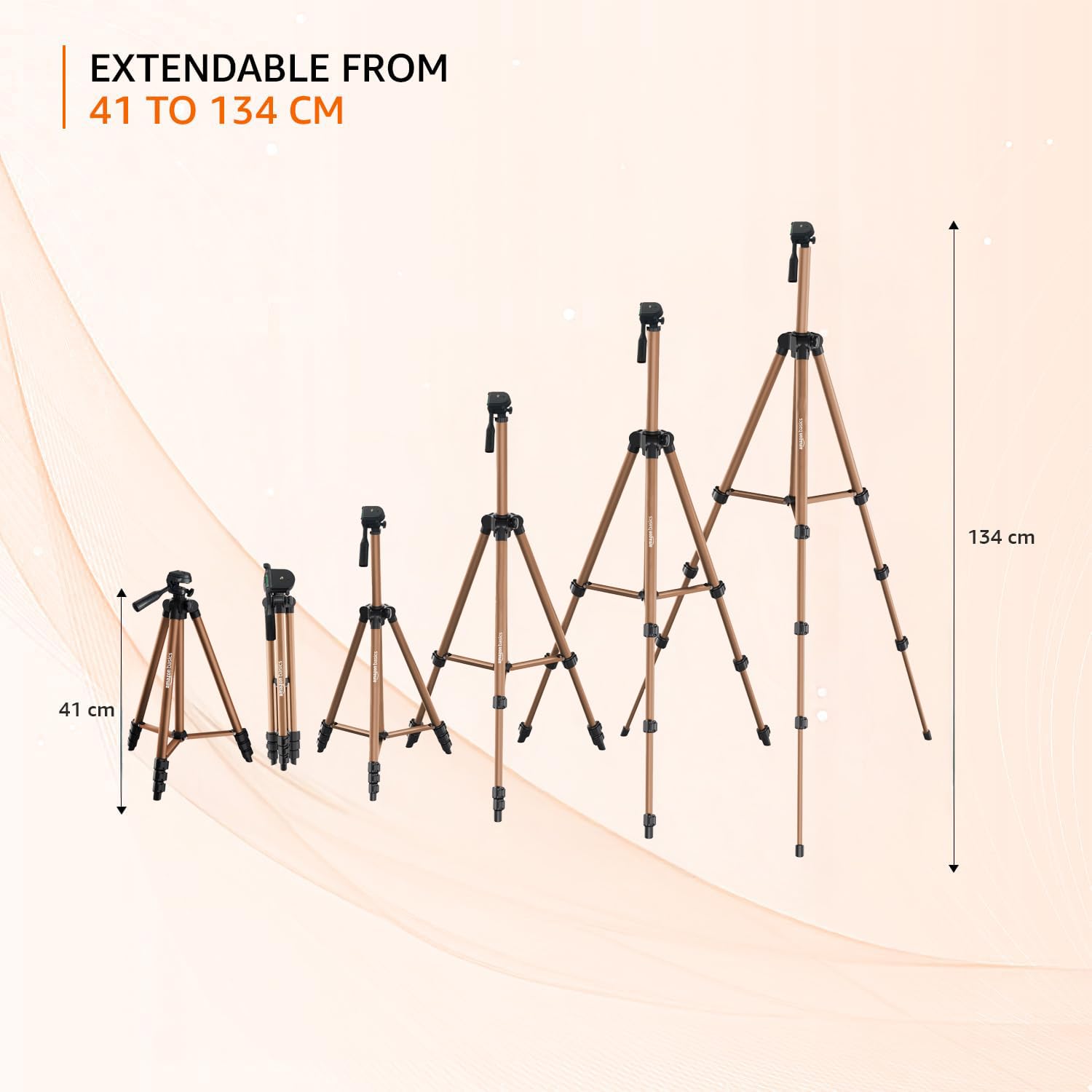 Set of extendable tripods with measurement indicators on a beige background