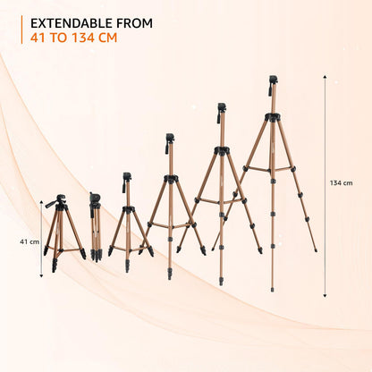 Set of extendable tripods with measurement indicators on a beige background